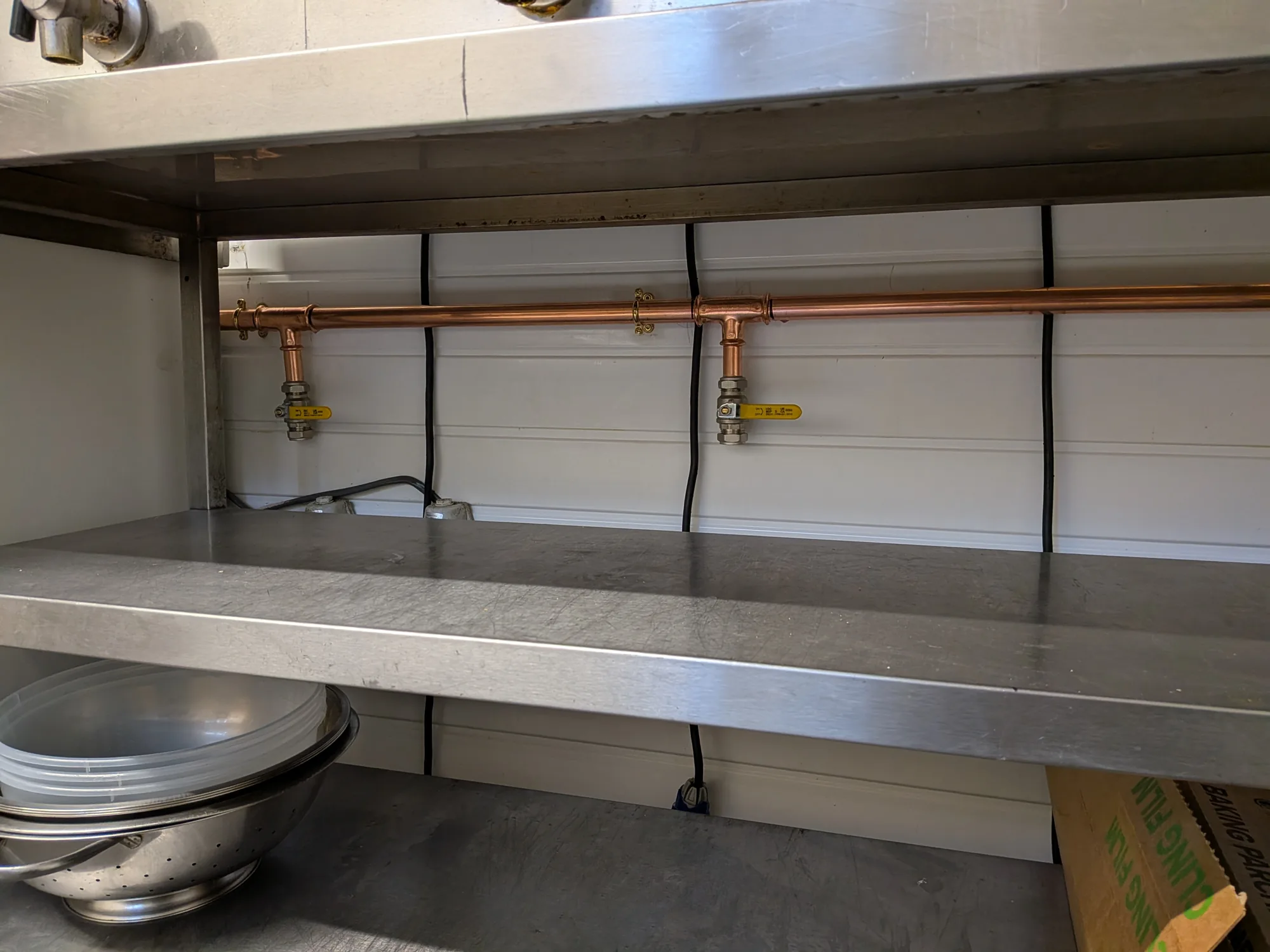 Neat copper pipework and valves installed by SRM Mechanical